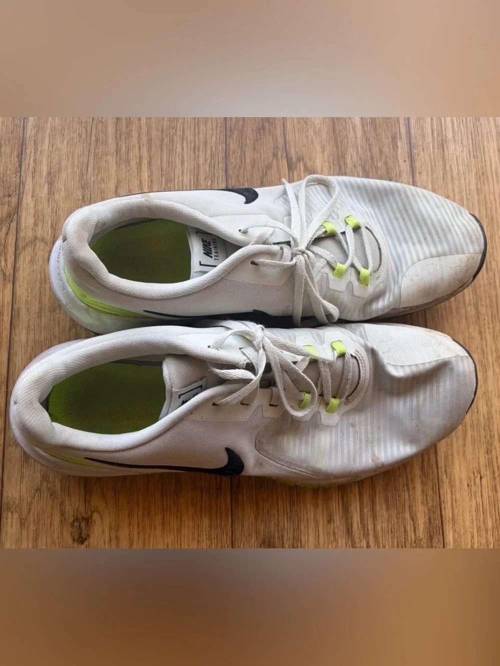 Nike Men’s White Athletic Sneakers with Black Swoosh and Neon Yellow Accents